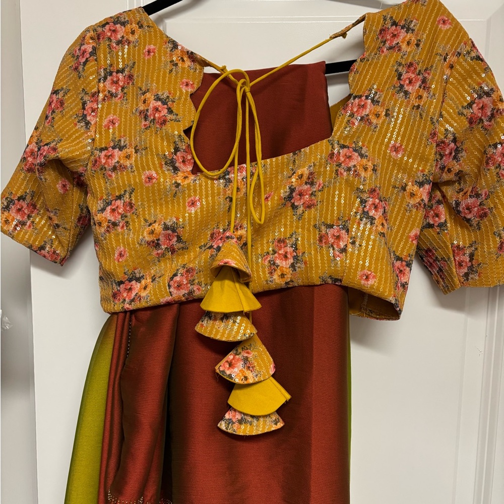 Beautiful plain saree and Floral Yellow and Red saree blouse with Tassels